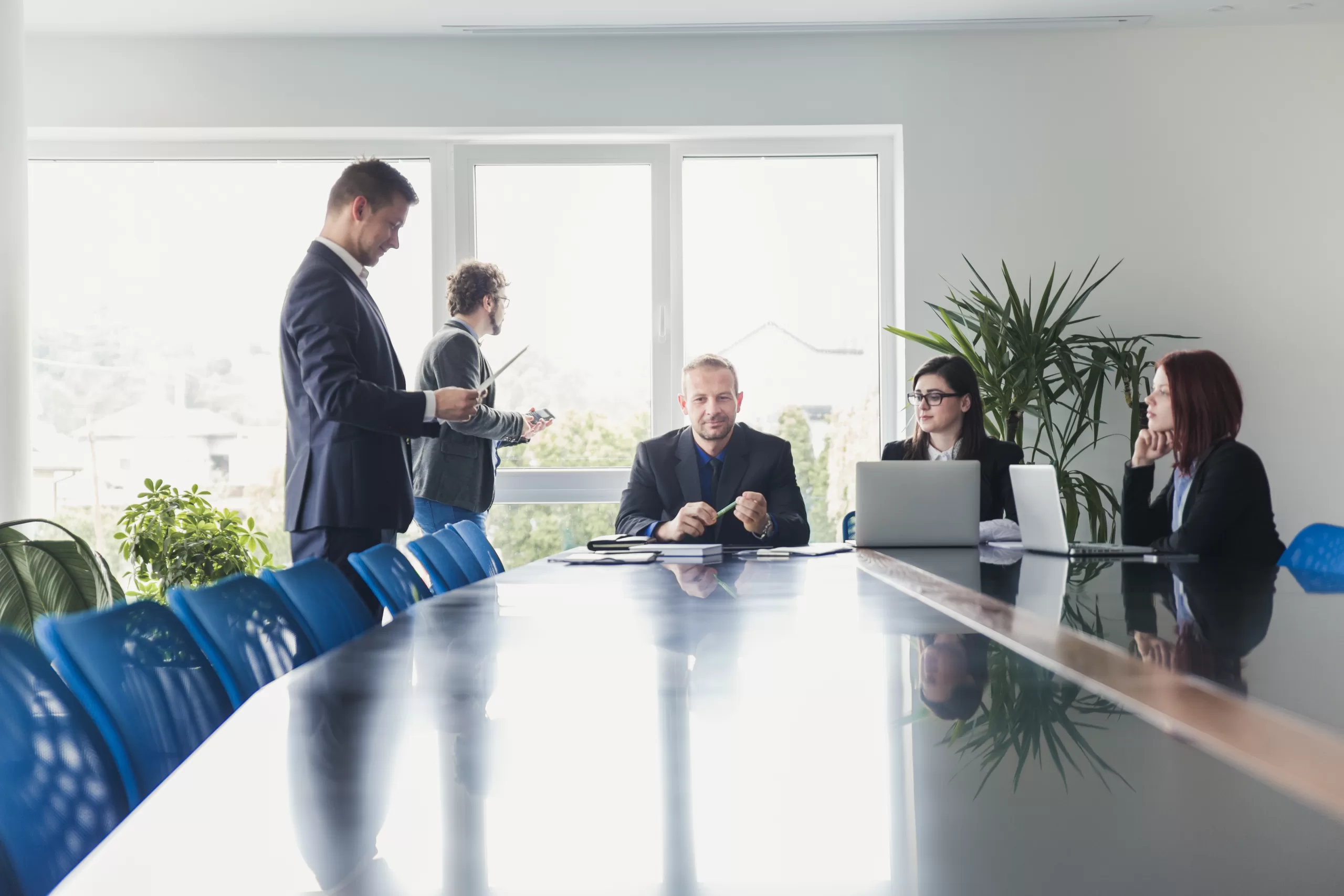 people-sitting-table-conference-hall